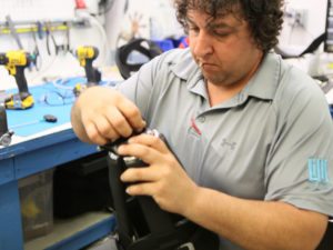 prosthetist working on an Infinite socket in a shop